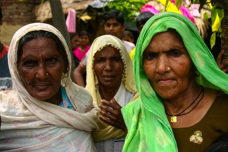 Amroha, Utar Pradesh, India - 2011: Unidentified Indian people from slumsのeditorial素材