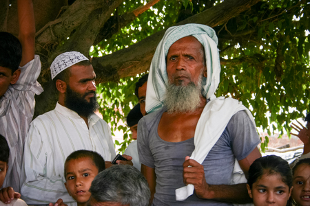 Amroha, Utar Pradesh, India - 2011: Unidentified Indian people from slumsのeditorial素材