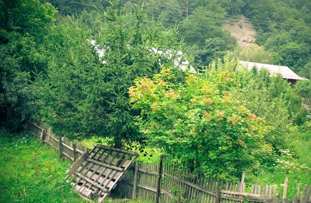 Old wooden fence on green meadow,Wooden fence, nature , a beautiful mountain landscape, Karpaty, Ukraineの写真素材