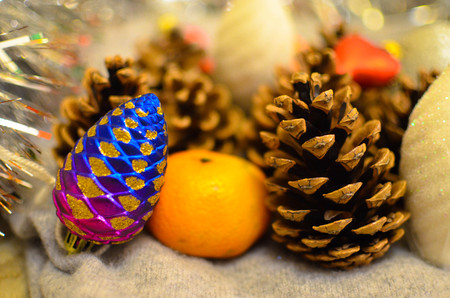 Christmas decoration with oranges and cones backgroundの写真素材