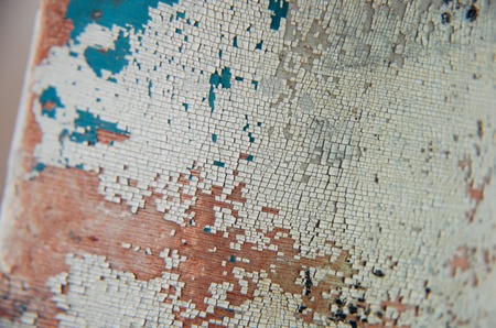 Scratched Paint at White Wood Vintage Wall as Textureの写真素材