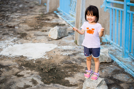 Children under the dock at sunsetのeditorial素材