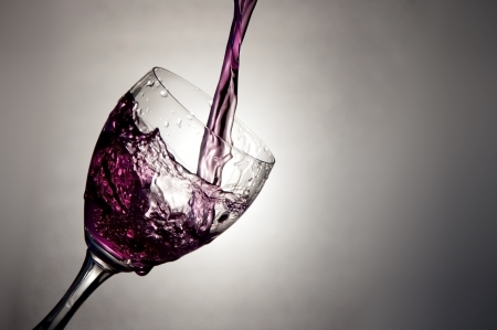 wine glass with purple liquid. abstractの写真素材