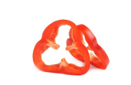 slices of red pepper on white backgroundの写真素材