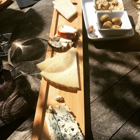 Cheese board with different types of cheeseの写真素材