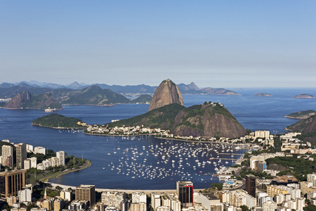 Day view of Sugar Loaf Mountain and Botafogo Beach in Rio de Janeiro, Brazil.