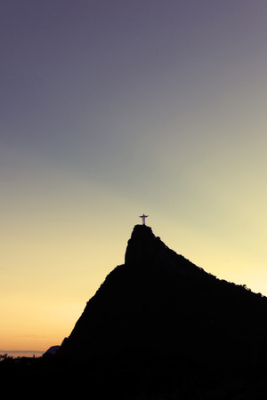 Christ the Redeemer Statue on top of Corcovado hill in the evening sunlight, Rio de Janeiro, Brazil.のeditorial素材
