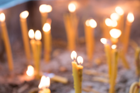 Blur burning incense and candle  for backgroud,abstract