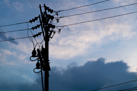 blue sky with cloud and silhouette electric pole in Line Thailandの写真素材
