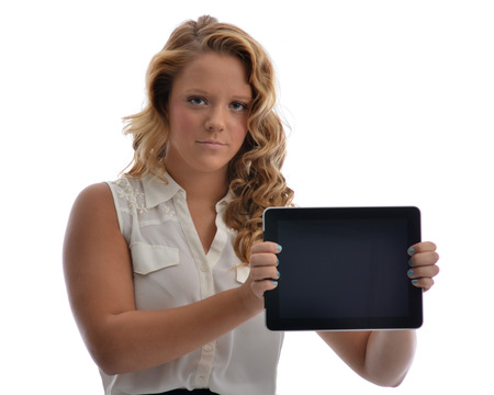 Girl holding computer on whiteの写真素材