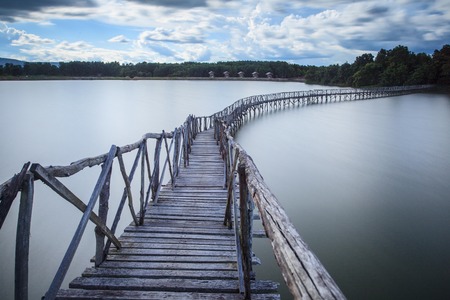 Wooden bridge crossover reservoir southern of Thailandの写真素材