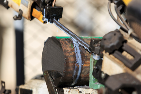 Material preparation cutting round bar by brand saw machineの写真素材