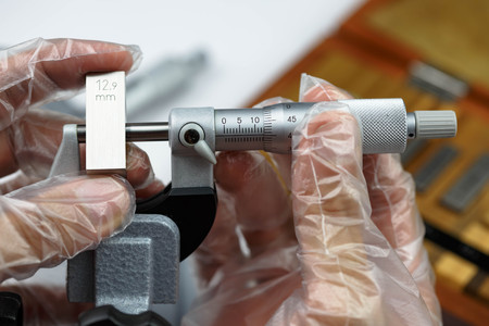 Calibration outside micro meter  with gauge blockの写真素材
