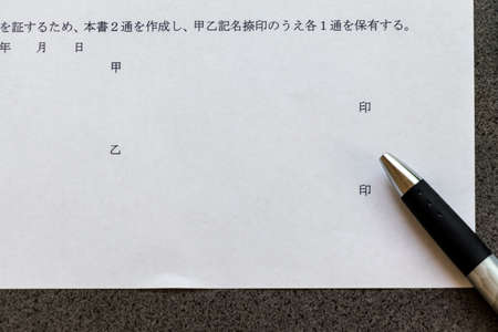 Signature and thumbprints on the contract