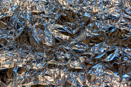 Texture of crumpled metal foilの写真素材