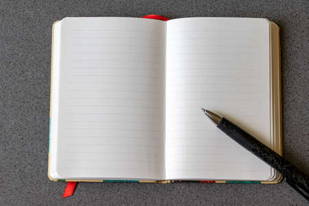 Notebook and pen on the table