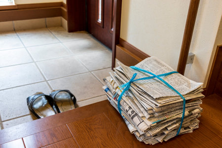 Old newspapers in the entrance hallの写真素材