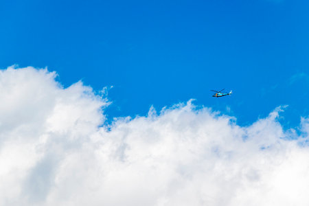 Helicopter flying in the skyの写真素材