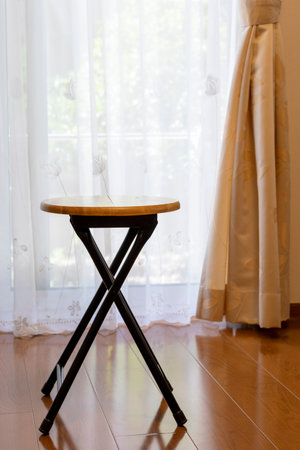 Foldable chair in the roomの写真素材
