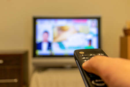 Press the button on the TV remote control