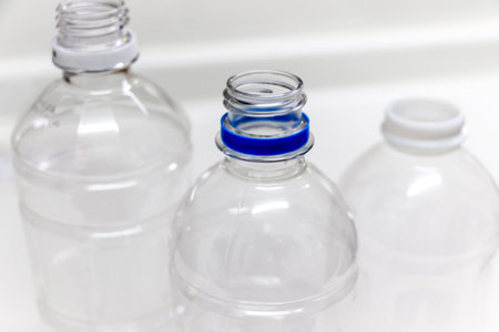 Empty plastic bottles with caps removed