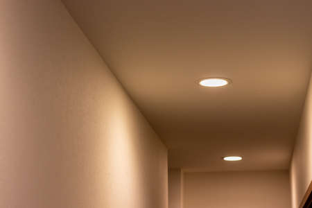 Small lights glowing on the ceiling in the hall
