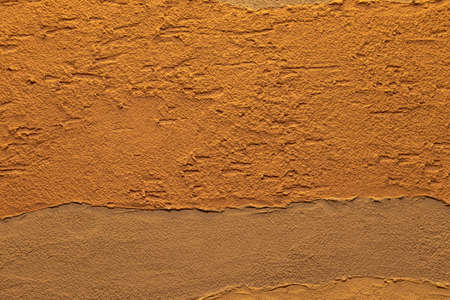 Texture of brown clay wall surface