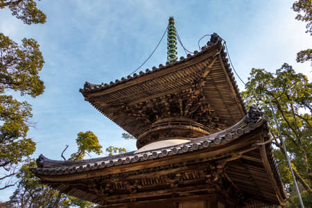 Old wooden pagoda and blue skyのeditorial素材