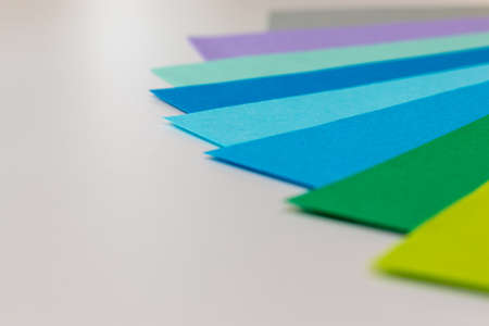 Cool color papers on the white tableの写真素材