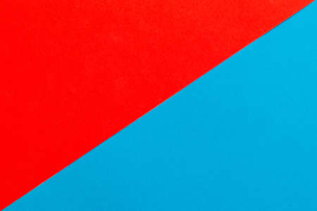 Red and blue areas separated by diagonal boundaryの写真素材