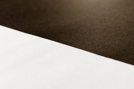 White and black areas separated by diagonal borderの写真素材