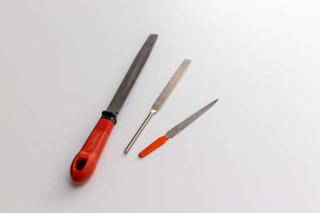 Three iron files on the white table