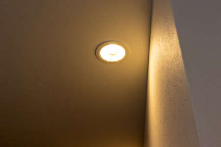 Ceiling downlight to illuminate the aisle
