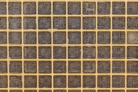 Old mesh filter with dust on itの写真素材