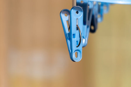 Plastic clothespins hanging in the room