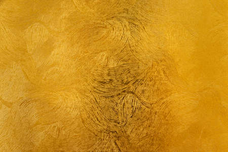 Golden paper with smooth curved pattern on the surface