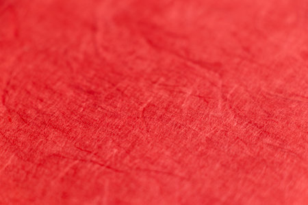 Surface texture of bright red washi paperの写真素材