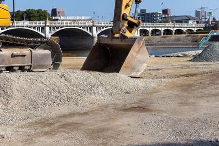 Excavator bucket on the groundの写真素材