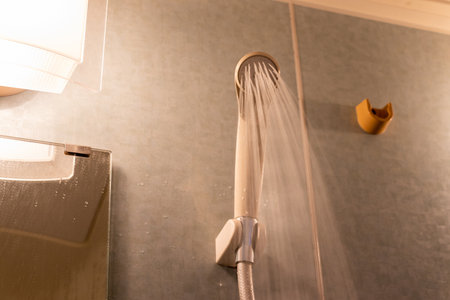 Shower head blowing out waterの写真素材