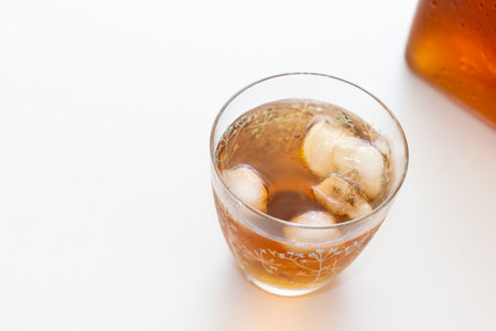 Cold tea with ice in a glass