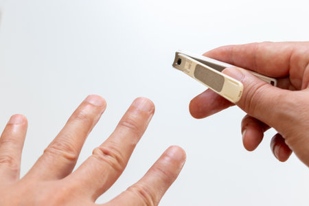 File fingernails with a nail file