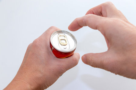 Opening a can of drink
