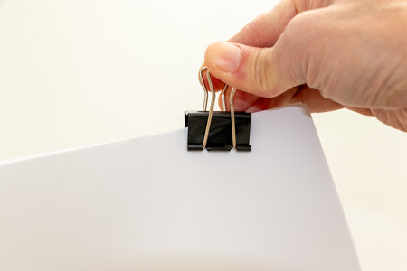 Bundle documents with a double clipの写真素材