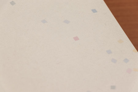 White Japanese paper on a wooden deskの写真素材