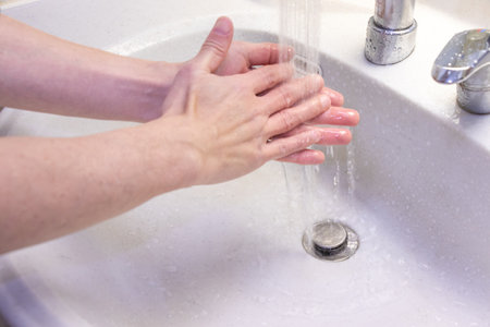 wash hands in the washbasin