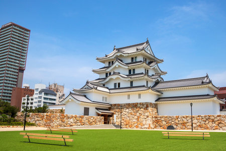 White castle tower with green open space in Amagasaki Castleの写真素材