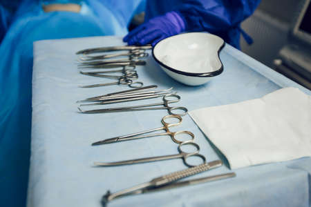 Close-up of surgical instruments in the operating room on the table. Preparation for surgery. Sterile instrumentsの写真素材
