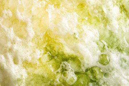 A close-up of a watercolor wash blending seamlessly across textured paper.の写真素材