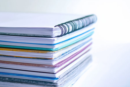 Stack of blank sketchbooks and art journals waiting to be filled.の写真素材
