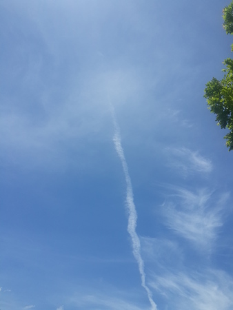 Blue Sky with Linear Cloudの写真素材